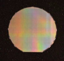 Vintage 6" Silicon wafer: SP6641 DC-DC boost regulator by Sipex Semiconductor