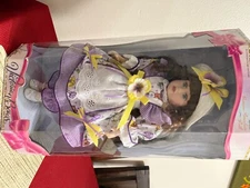 Victorian Bow Geniune porcelain doll, brass key #2500, brunette