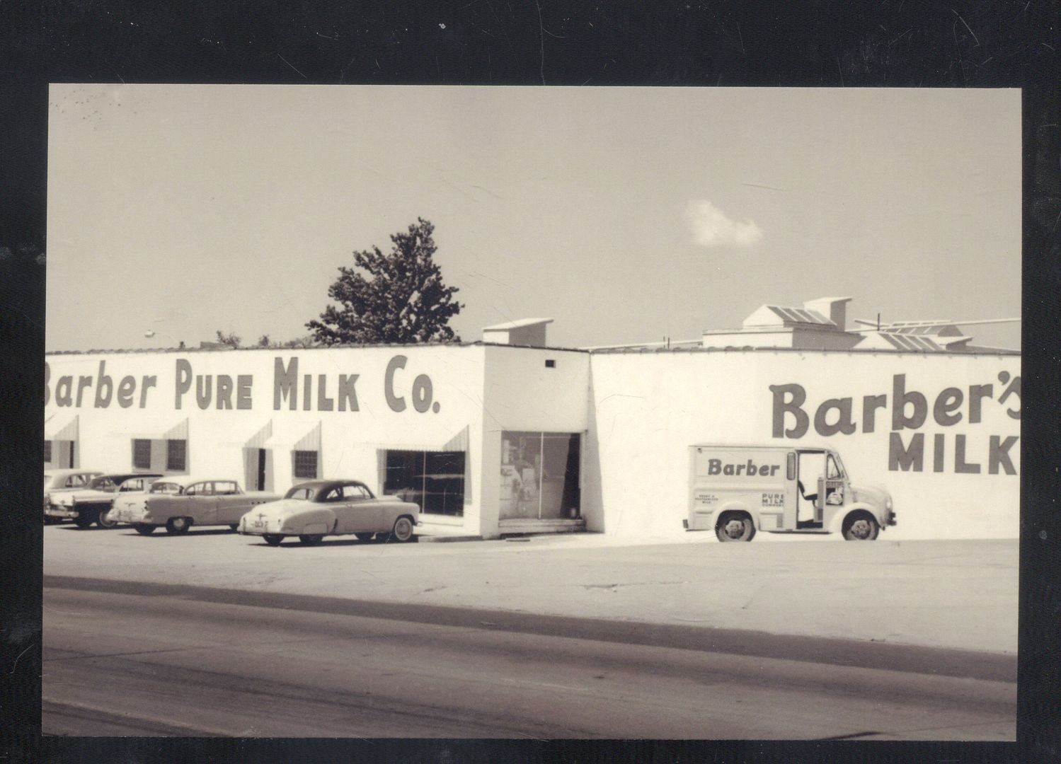 REAL PHOTO TUPELO MISSISSIPPI BARBER MILK COMPANY OLD CARS POSTCARD