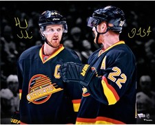 Daniel Sedin and Henrik Sedin Canucks Signed 16x20 Throwback Spotlight Photo