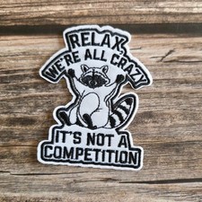 Relax We're All Crazy Its Not A Competition Raccoon Funny Iron On Patch