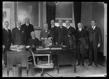 Photo:[Group; Andrew W. Mellon at desk]