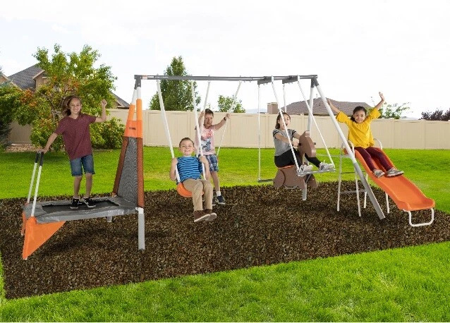 Swing set with clearance trampoline