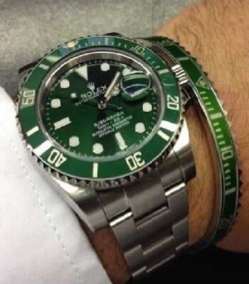 Speedometer Official in grün ''Hulk'' mit runder Neoprentasche ROLEX