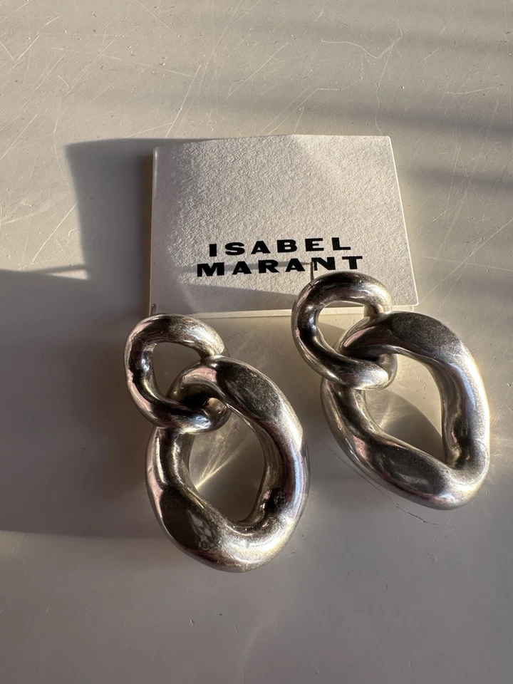Pendientes Isabel Marant Boucle D'oreill en plata $490 Foto 2 de 4