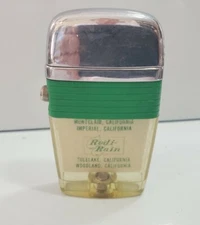 Vintage Working  Scripto VU Lighter "REDI RAIN" LOGO ADVERTISING, GREEN 4407/29