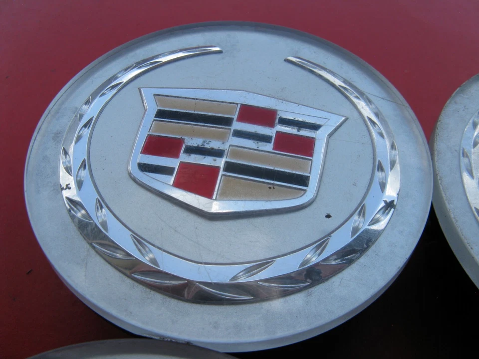 CADILLAC ATS CTS DTS SRX STS XLR XTS TAPACUBOS TAPACUBOS TAPACUBOS CUBIERTA CENTRAL 165 Foto 2 de 4