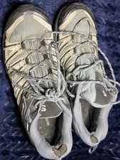 Salomon sneakers are Women’s Size 10 US (EU 42½, UK 9½, 27.5 cm)