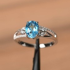 2.20Ct Oval Cut Lab-Created Blue Topaz Engagement Ring 14K White Gold Plated