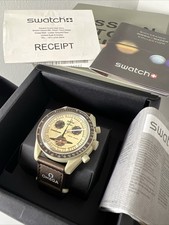 OMEGA X Swatch , Moonswatch Mission To Saturn , New Unworn Full Set .