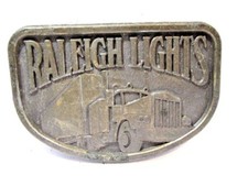 OLDER BRASS BELT BUCKLE RALEIGH LIGHTS RAISED TRUCK RIG DESIGN