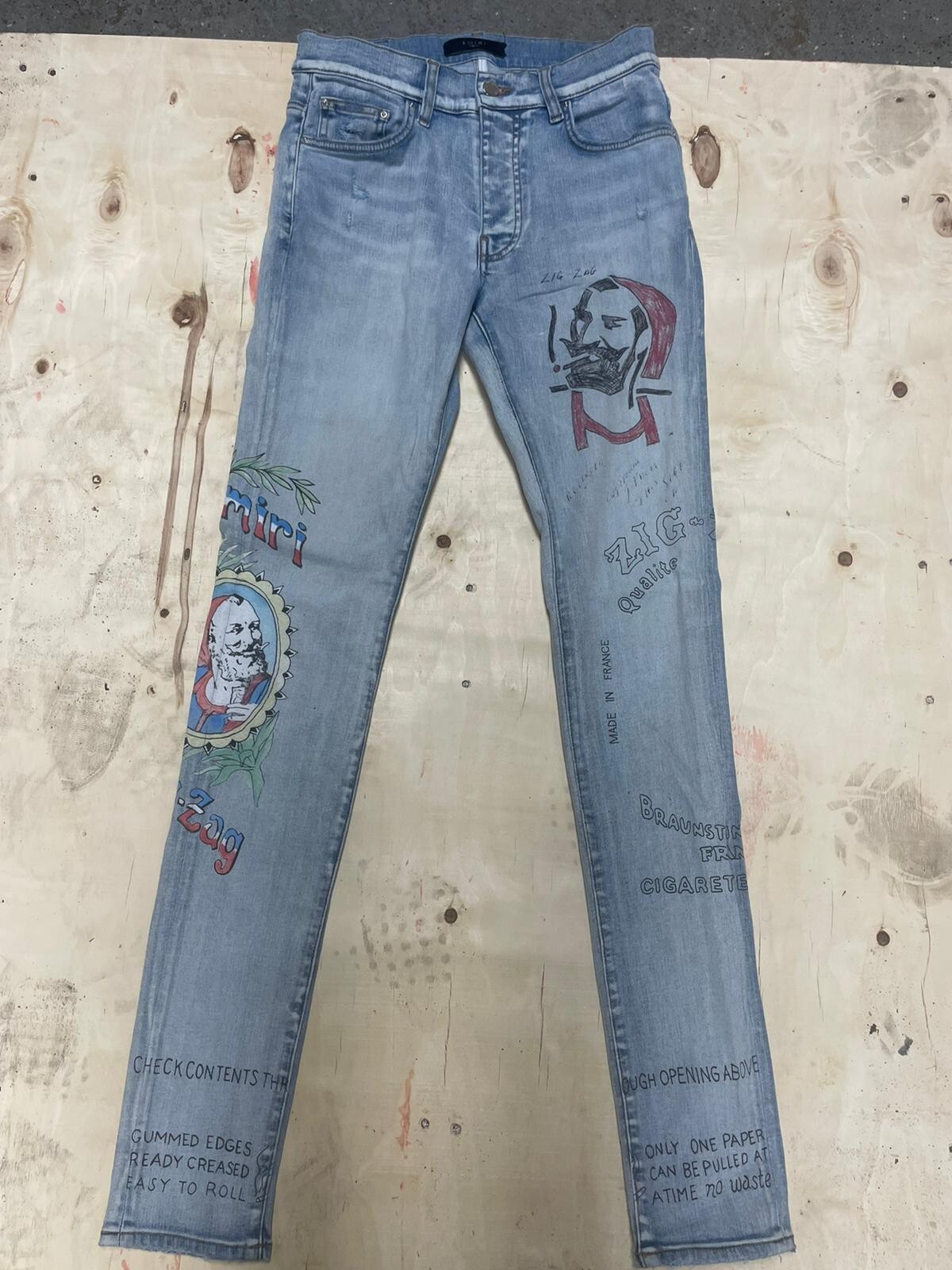 AMIRI  Zig Zag motif-print skinny jeans