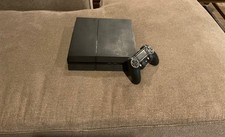 Sony PlayStation 4 black 668 GB used home console made for kids and adults