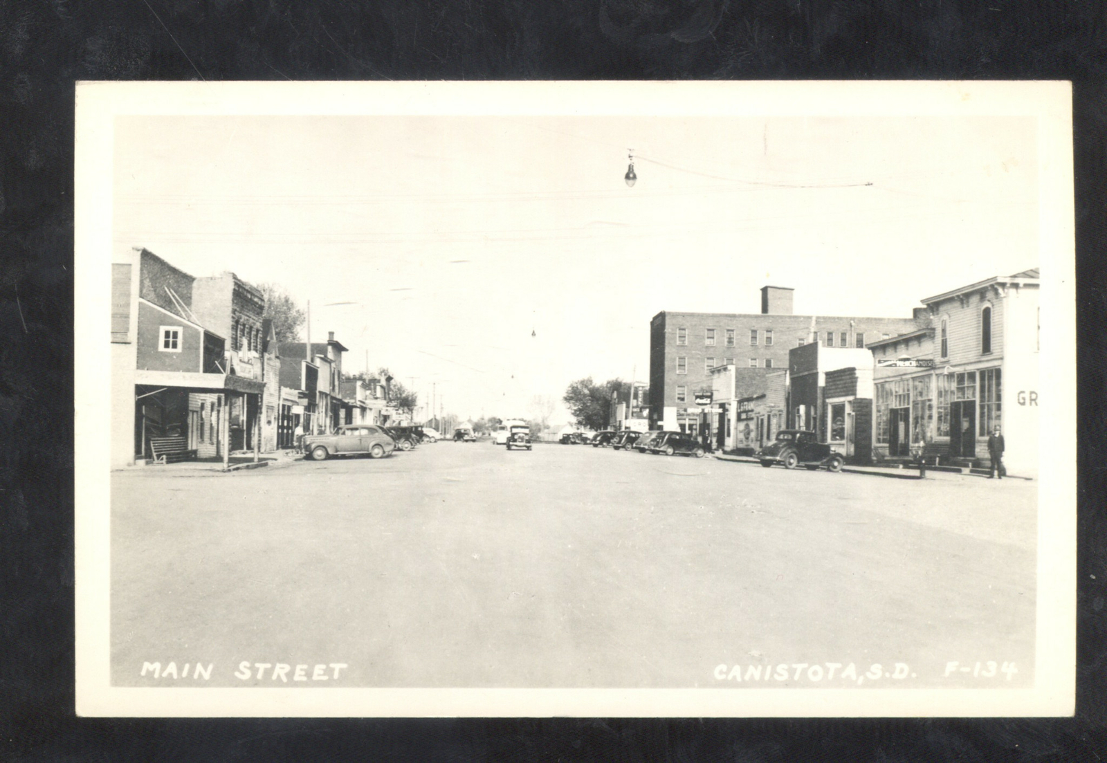 RPPC CANISTOTA SOUTH DAKOTA S.D. DOWNTOWN MAIN STREET SCENE REAL PHOTO