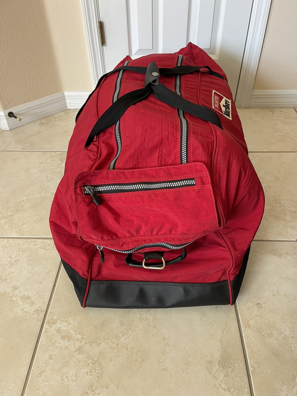 Marlboro Unlimited Gear Wheeled Duffle Bag Red & Blac… Gem