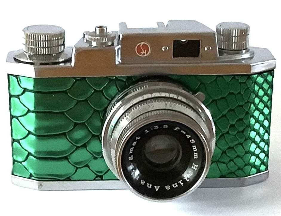 VINTAGE HALINA 35X CAMERA.  METALLIC GREEEN LIZARD SKIN COVERED. WORKING.