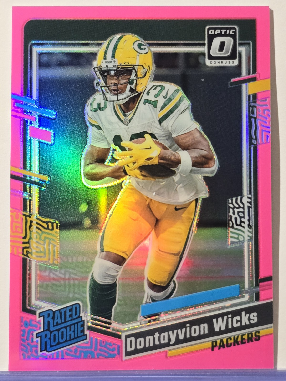 2023 Panini Donruss Optic - Rated Rookie Pink Prizm #249 Dontayvion Wicks (RC)