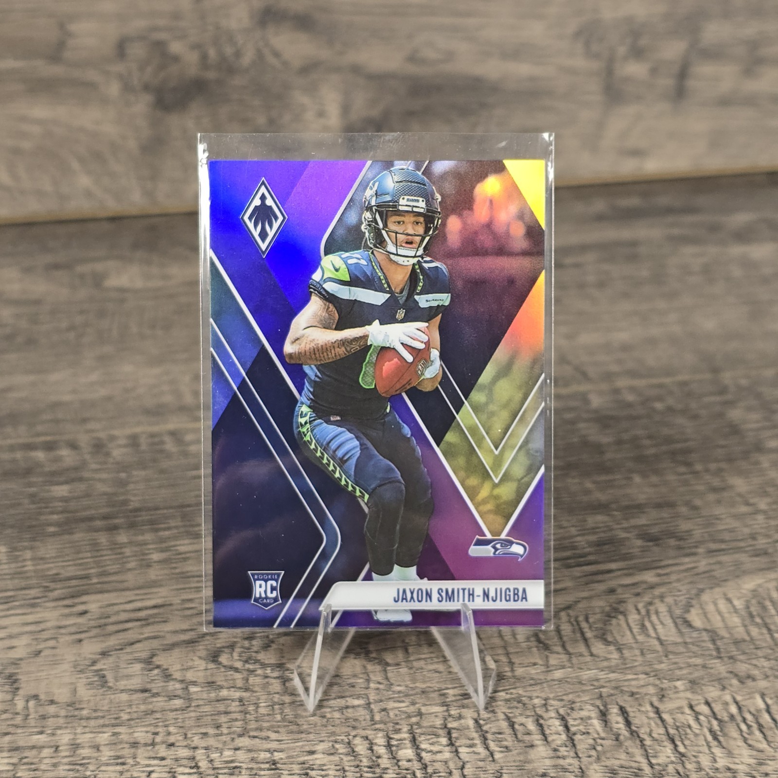 2023 Panini Phoenix - Rookies Jaxon Smith-Njigba #106 Purple /125 (RC)