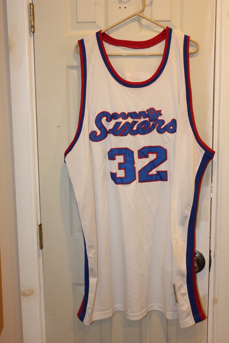 white 1970–71 Philadelphia 76ers (Sixers) Billy Cunningham (32