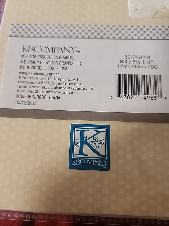 Álbum de fotos K&Company bebé niño 4x6 36 con elefante azul naranja león y mono  Foto 4 de 4