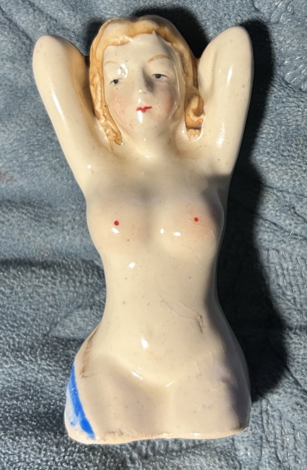 A 1950s kneeling figure salt or pepper shaker from Japan — kitschy, slightly surreal, and exactly the kind of mid-century oddity that sparks conversation on any shelf.