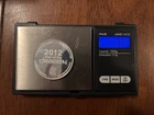 ONE TROY OUNCE .999 FINE SILVER 1.10 OZ 2012 Year of the Dragon Silver Round