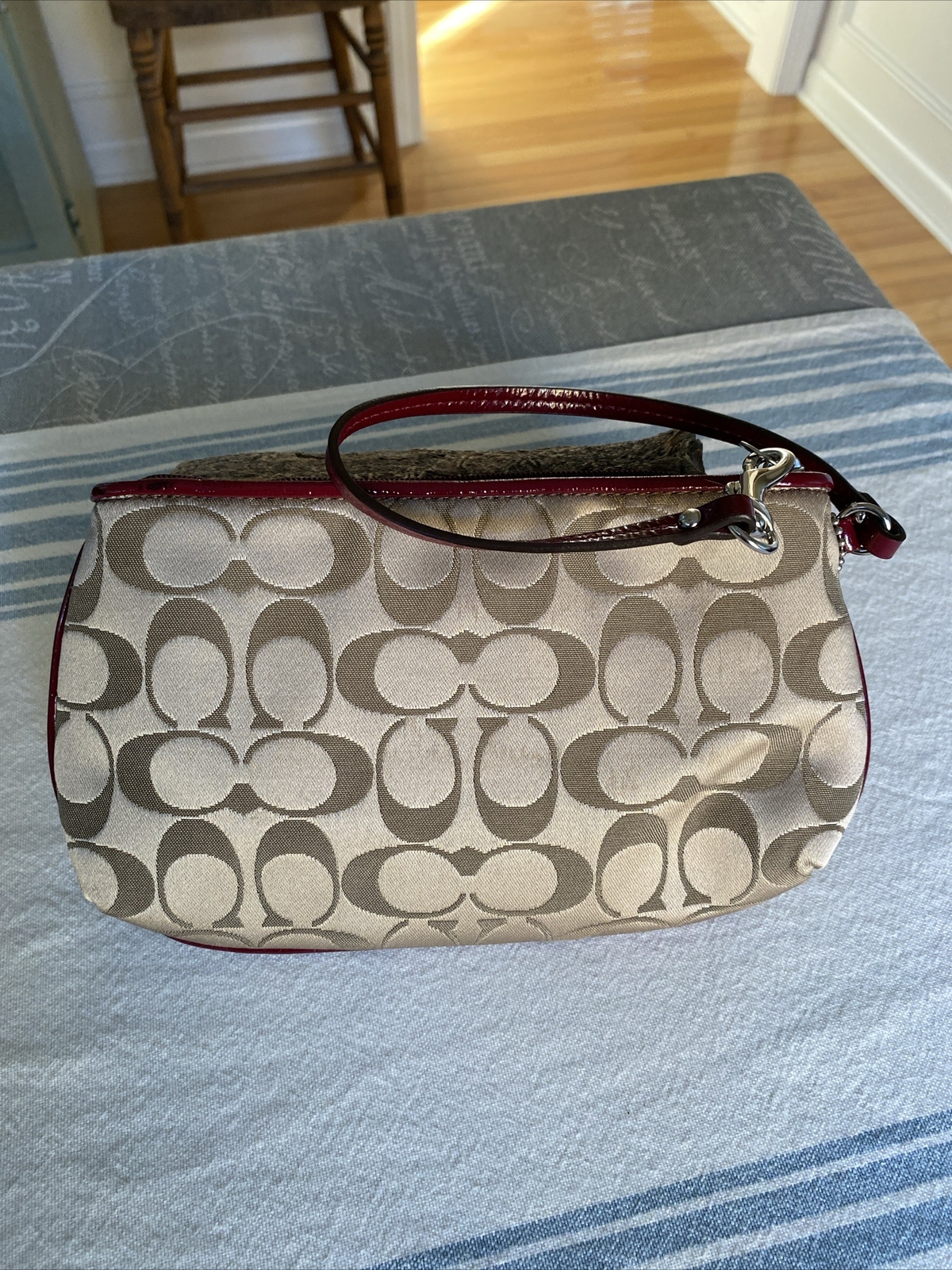 COACH SIGNATURE JACQUARD WRISTLET WITH MAROON LEATHER… Gem