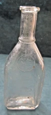 Antique Nyal Quality clear glass medicine/ apothecary bottle