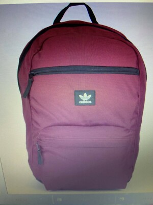 adidas burgundy backpack Striker II Team Step out with confidence and style with the Essentials Material Backpack adidas Striker 3 Backpack -
