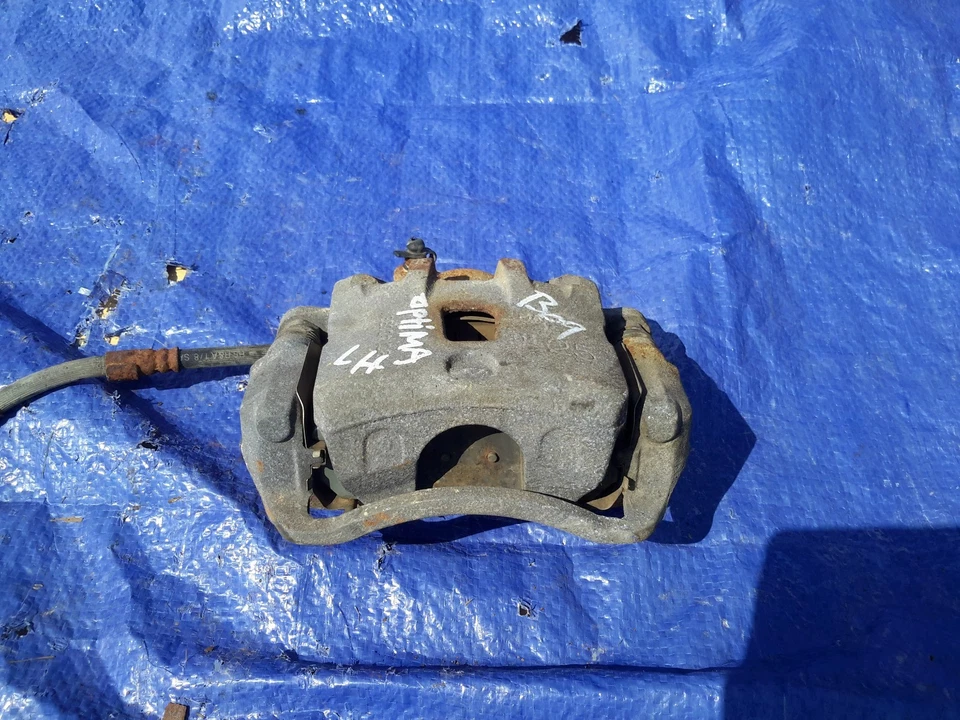 Pinza de freno delantera izquierda Kia Optima 2006-2010 OEM Foto 2 de 4
