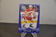 O pee chee hockey 2024-25 Blue Border Parallel 143 Andrei Kuzmenko Calgary Flame