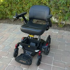 GOLDEN TECHNOLOGIES BuzzAround CarryOn Folding Power Chair Model GP130 Red Blue