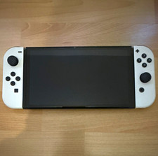 Nintendo Switch OLED Weiß Handheld 64 GB + 2...