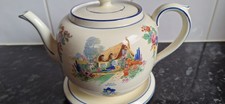 A bit of  Of Olde English    Gibson Teapot and Stand.