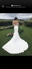 White Lace V-Neck Sleeveless Mermaid/Trumpet Wedding Dress with Train