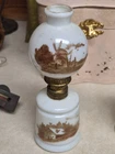 Miniature oil lamp with brown windmill on white milkglass