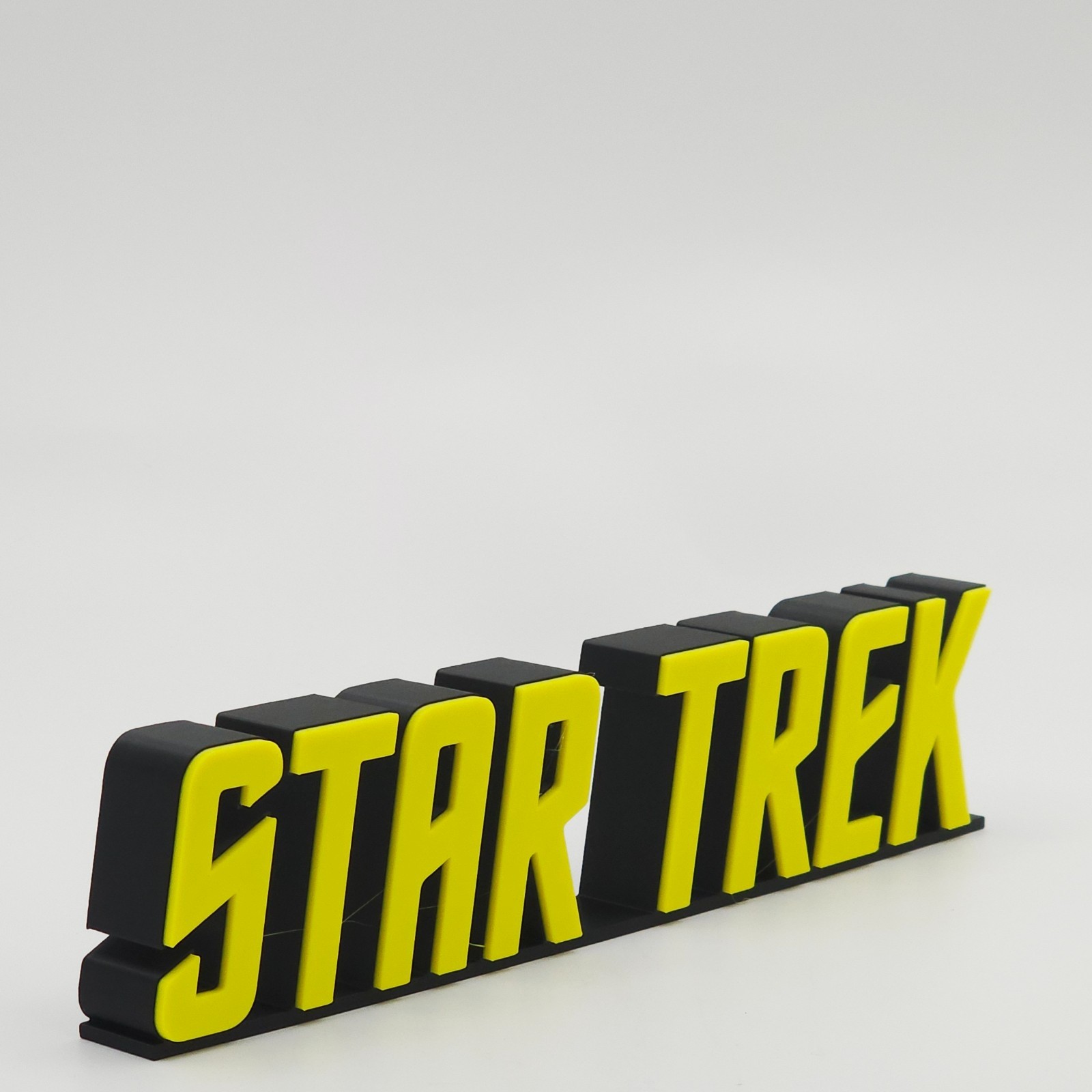 3D Printed Sci-Fi Logo Sign: Retro Yellow Freestanding Prop