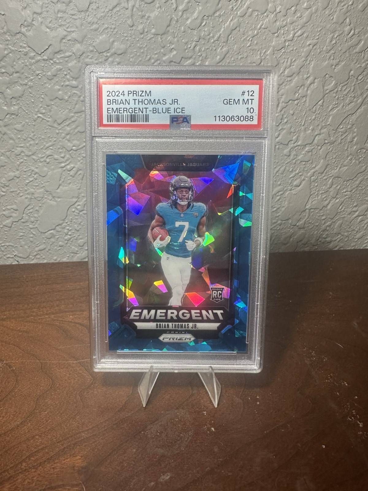 2024 Panini Prizm - Emergent Brian Thomas Jr. #12 Blue Ice Prizm /99 (RC) PSA 10