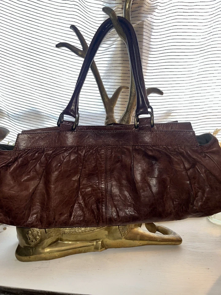 Cartera ancha con lazo de cuero Caterina Lucchi PRECIOSA Foto 2 de 3