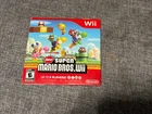 New Super Mario Bros. Wii Nintendo 2009 disc in cardboard sleeve ,no manual