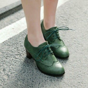 heeled brogue boots