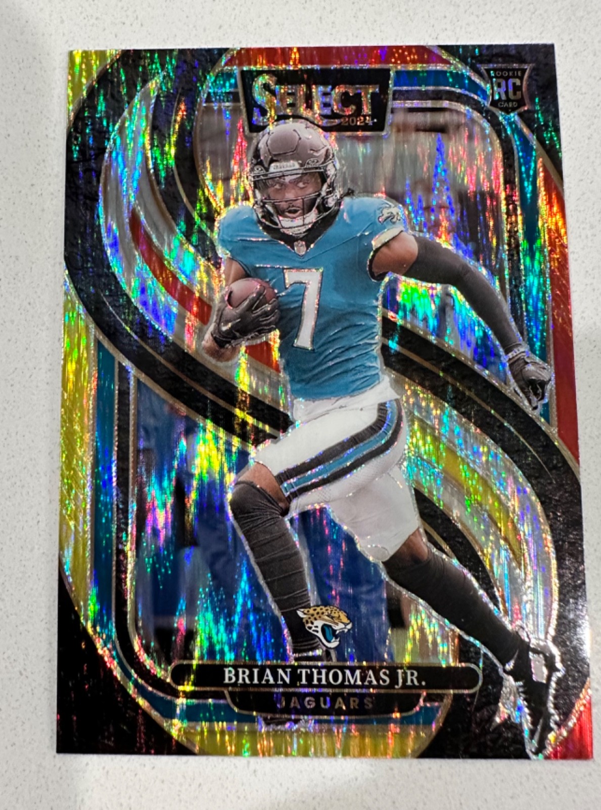 2024 Select - Premier Level Brian Thomas Jr. #143 Red & Yellow Shock Prizm