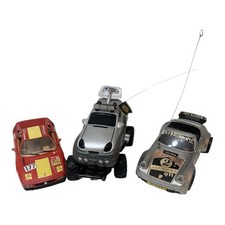 Lot of 3 Vintage Cars: Bburago Ferrari 348, Tyco RC Truck, Porsche 911 Jet Racer