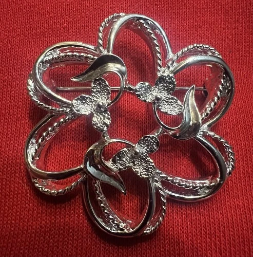 vintage costume jewelry brooch signed by designer Sarah Coventry