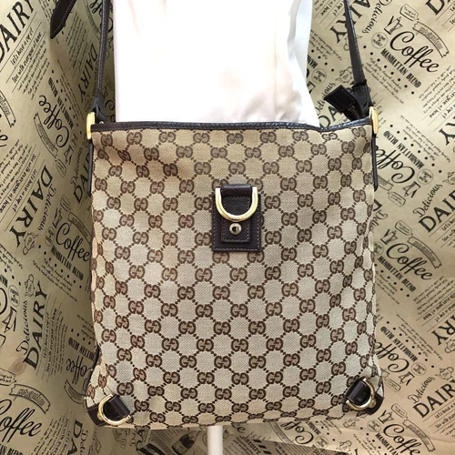 Sac bandoulière Gucci GG suprême toile cuir beige Sacoche Abby hardware accent