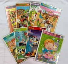 7 Golden Frame Tray Disney Puzzles (1980's) & 1 Little Pig-sealed dated 1979