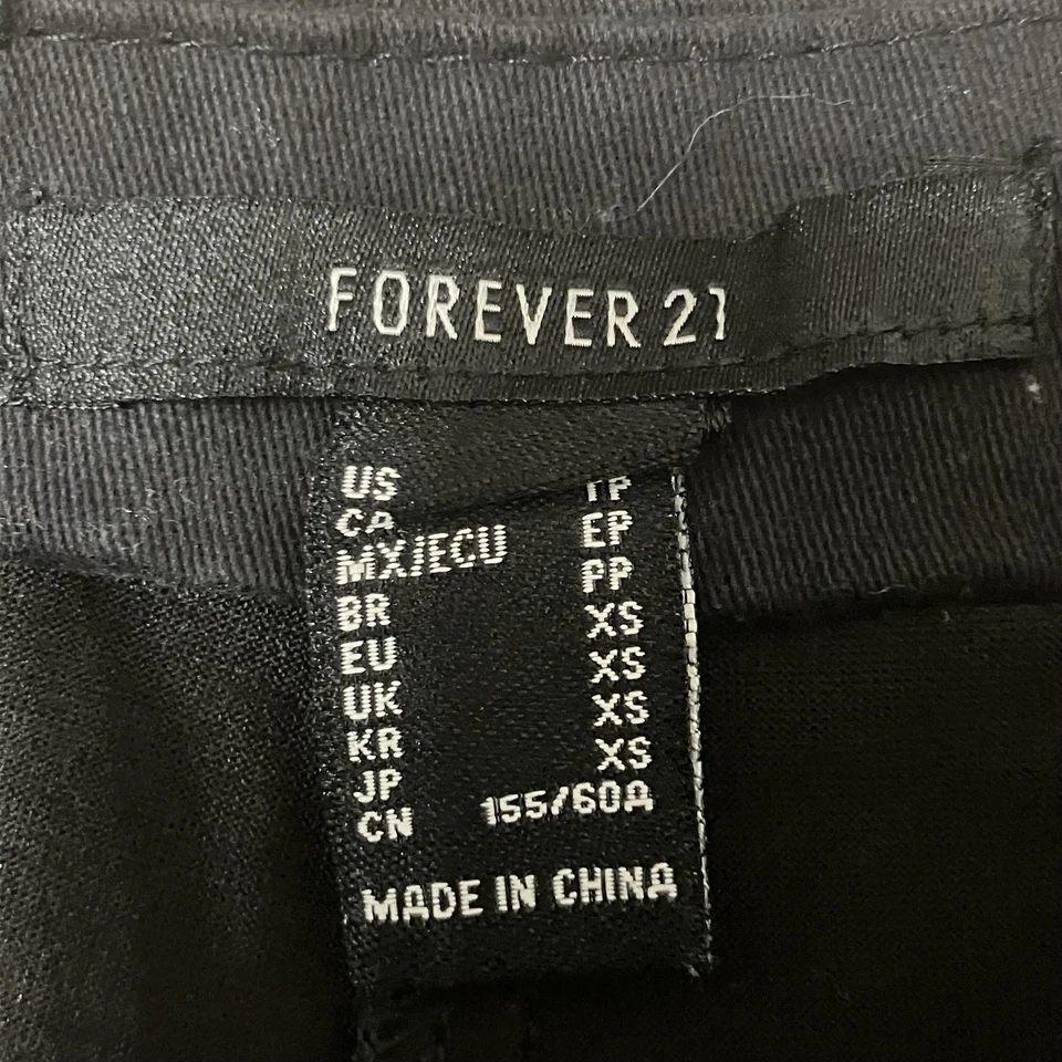 Minifalda para mujer Forever 21 negra de moda Y2K plisada XS Foto 2 de 2