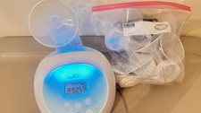 Spectra S1 Breast Pump with Additional Supplies. READ DESCRIPTION