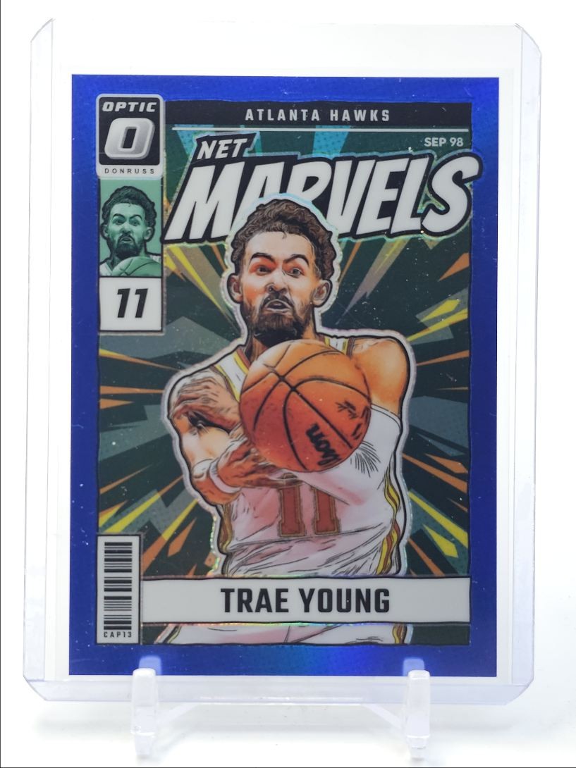 TRAE YOUNG 2024-25 DONRUSS OPTIC NET MARVELS BLUE PRIZM HAWKS #9 /49 Q4407