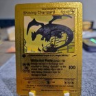 Shining Charizard 1st Edition Gold Pokemon Card 107/105